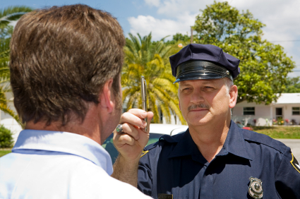 A police officer is talking to another person.