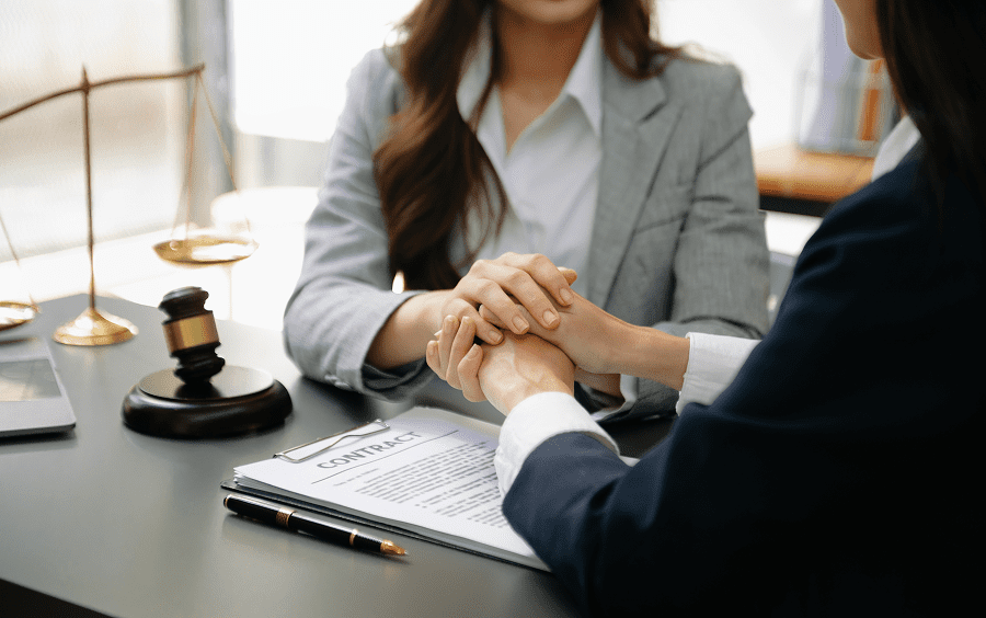 Two professionals discussing a legal contract.